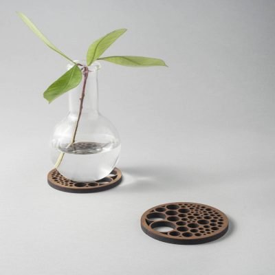 Bubbles drinks coasters in genuine walnut, geometry, circle packing